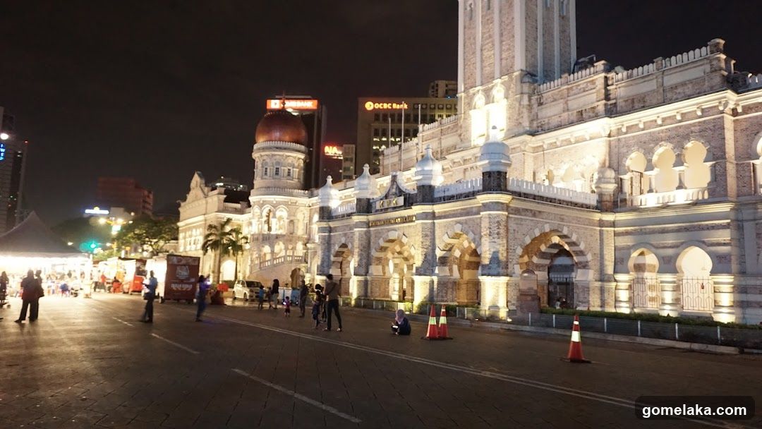 Nighttime Urban Square with Historic Building