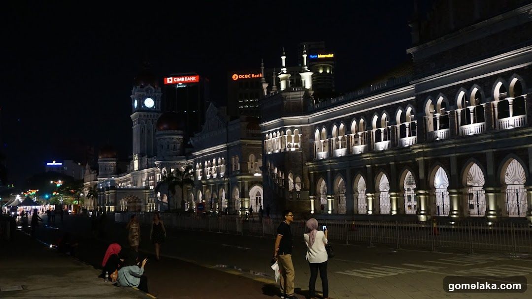 Nighttime urban scene with illuminated buildings