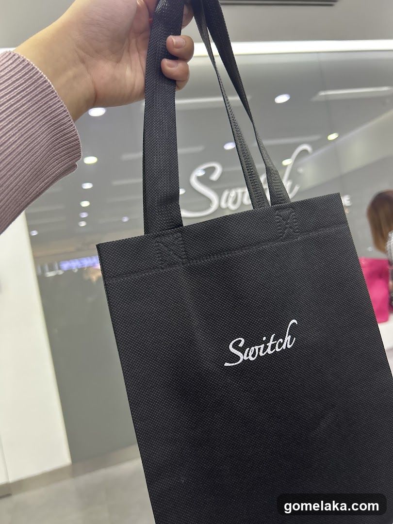 Shopping Bag Held in Hand