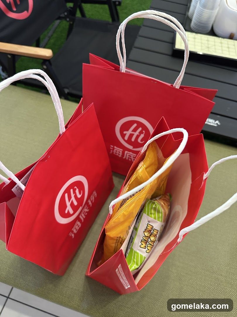 Red shopping bags with logo