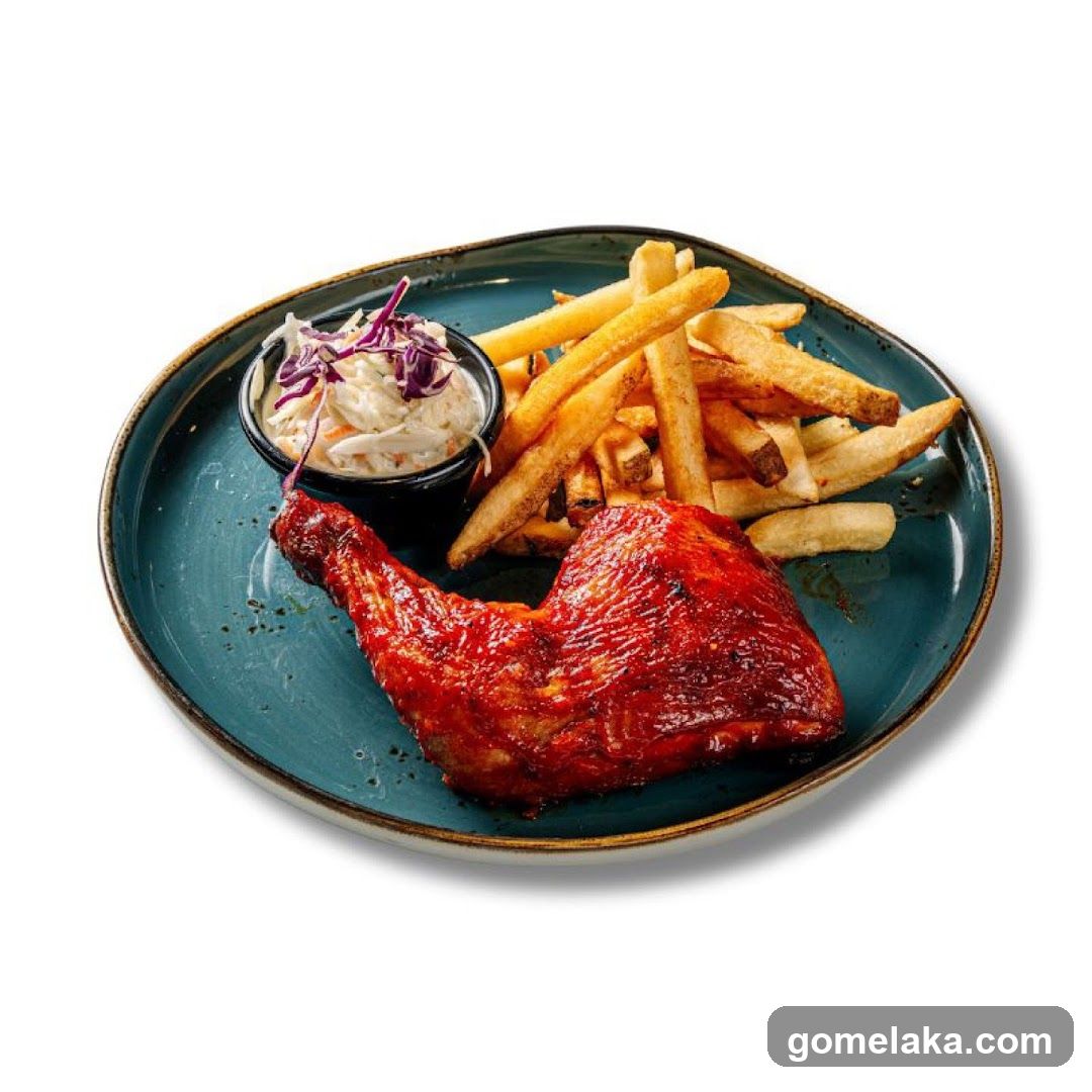 Roasted Chicken Leg with Fries and Coleslaw