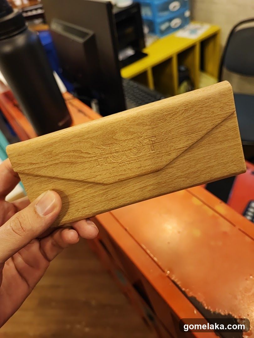 Wooden Sunglasses Case Held in Hand