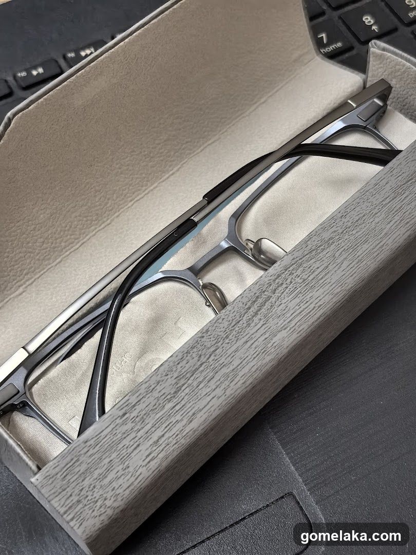Glasses in Case on Laptop Keyboard
