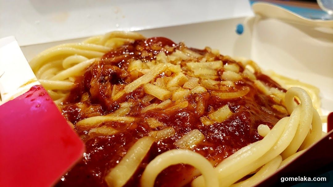 Spaghetti dish in takeout container