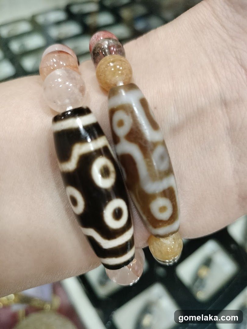 Hand wearing Tibetan Buddhist beads bracelet