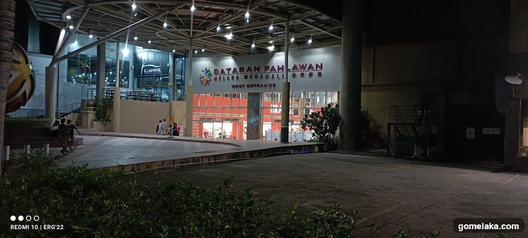 Nighttime exterior of shopping mall entrance