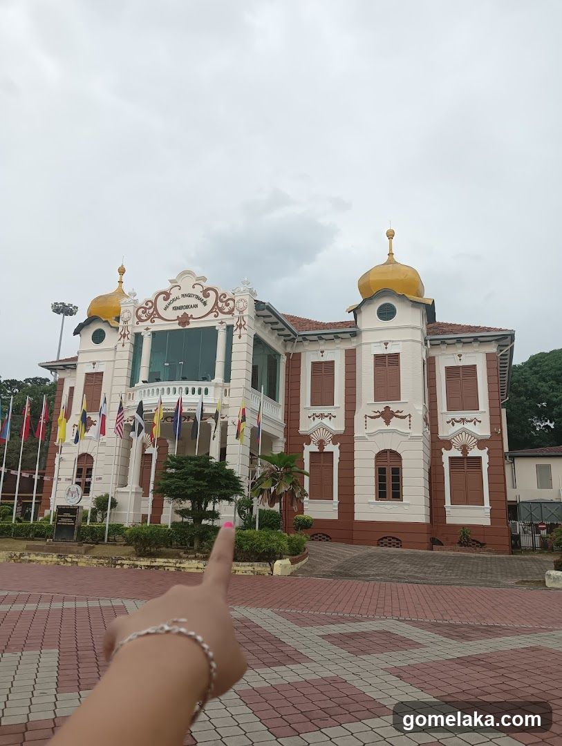 Building with ornate facade and flags