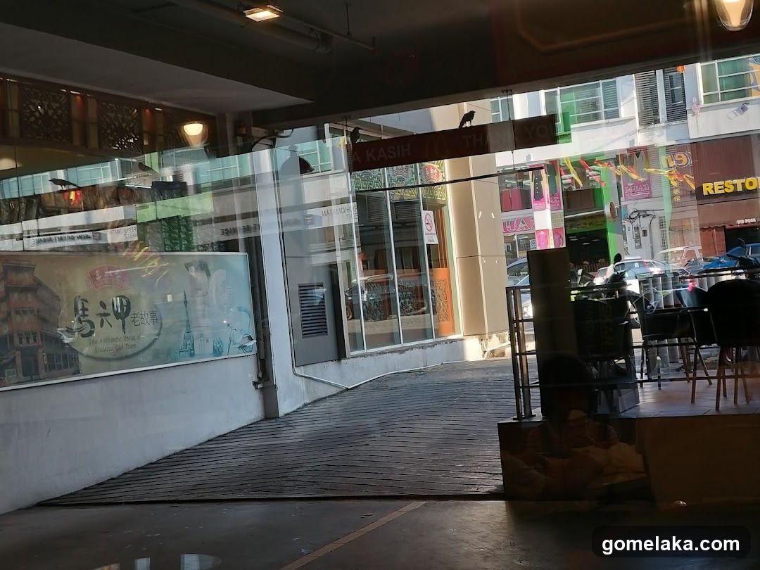 Outdoor seating area with glass facade