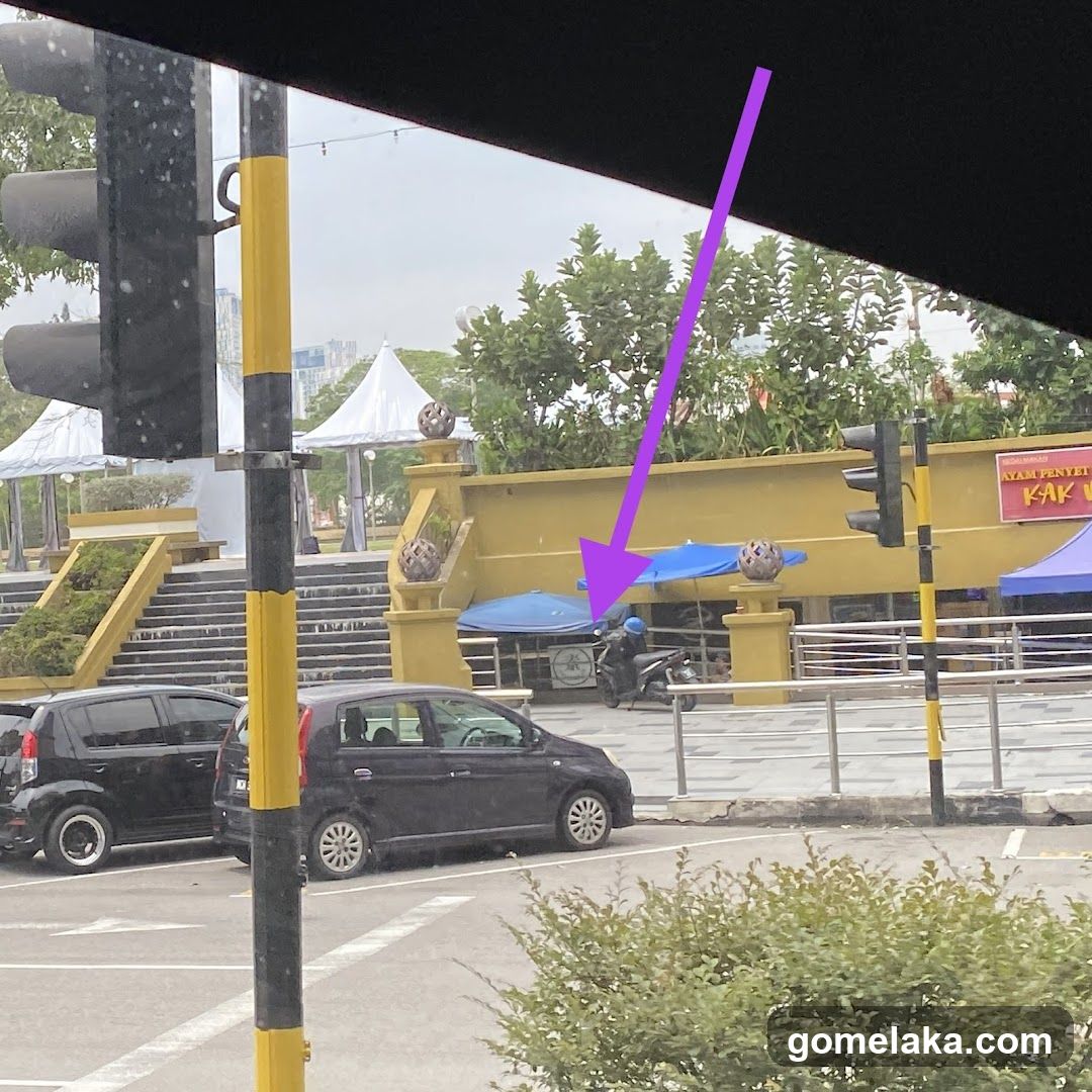 Outdoor street scene with traffic and structures