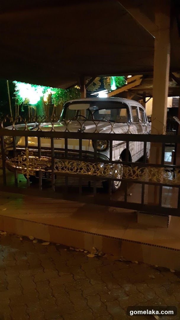 Vintage Car Display at Night