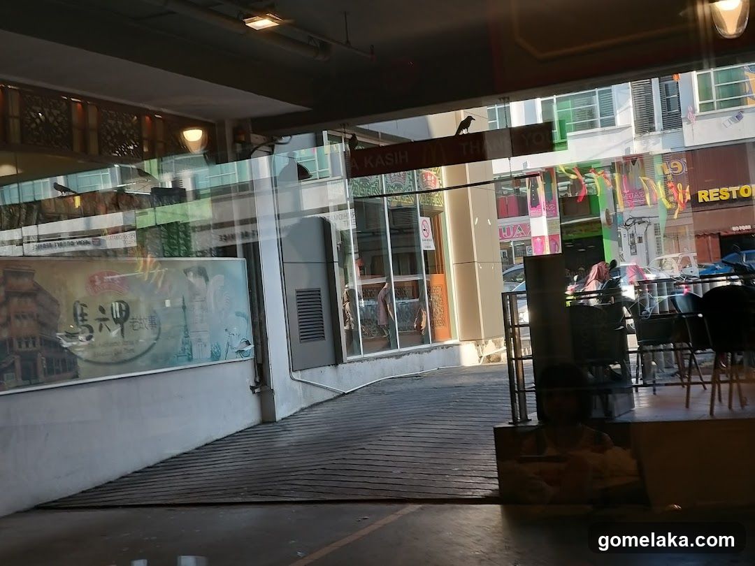 Outdoor seating area with glass facade