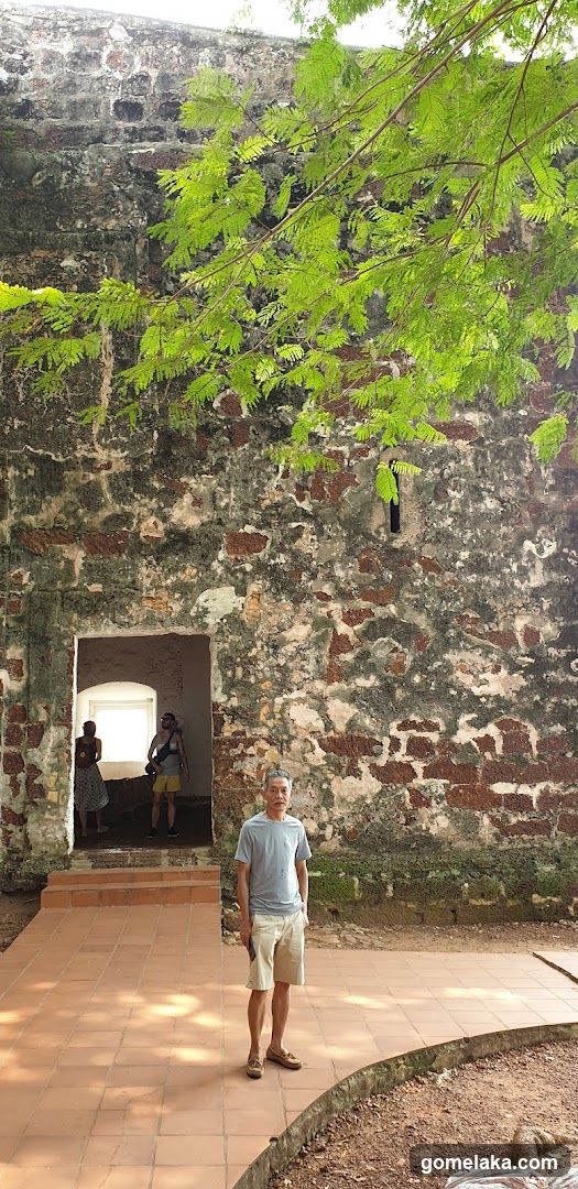Historic Stone Structure with Visitors