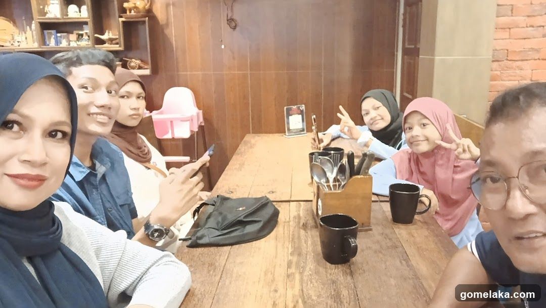 Group photo inside a café or restaurant