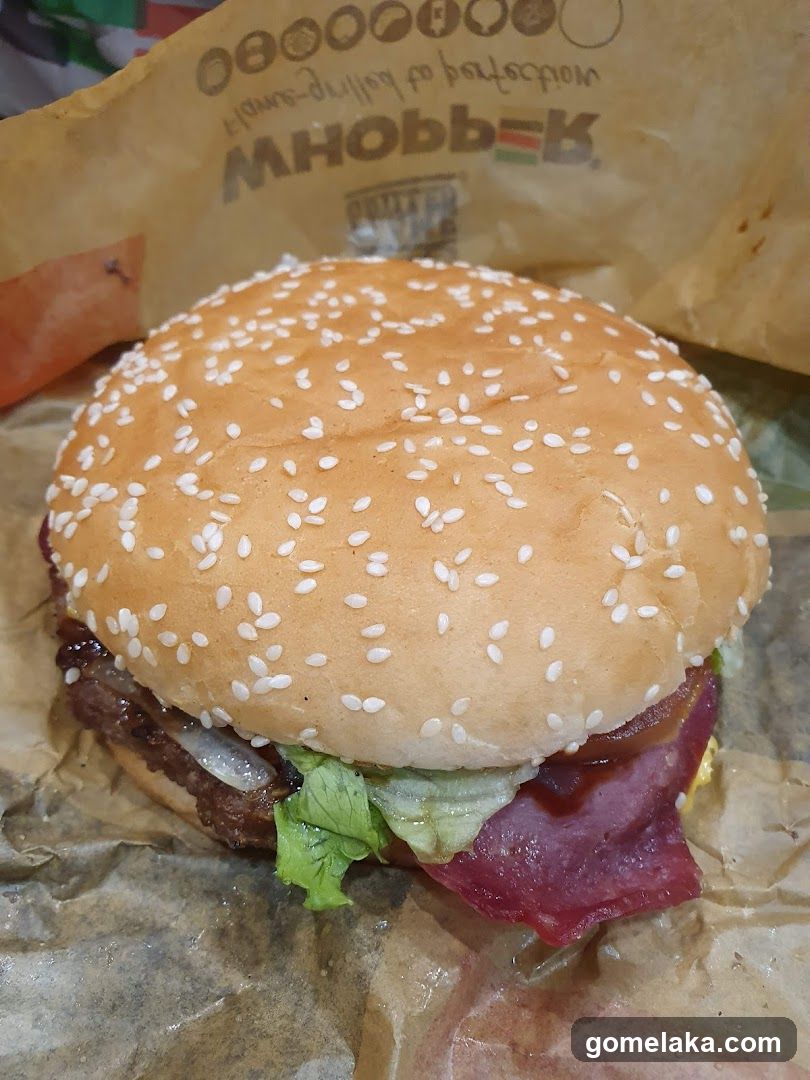 Burger on paper wrapper