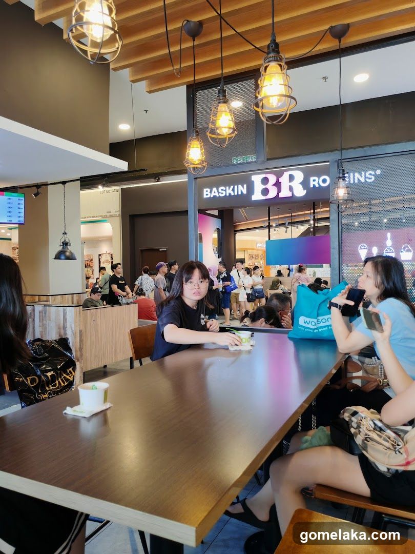 Interior of food court with Baskin-Robbins storefront