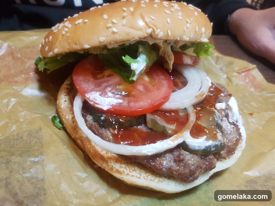 Burger on paper wrapper