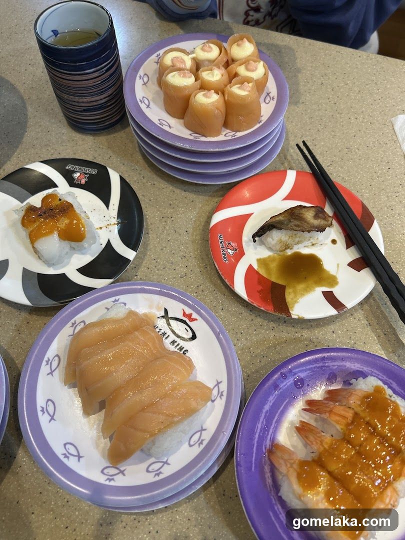 Sushi Plates and Utensils on Counter