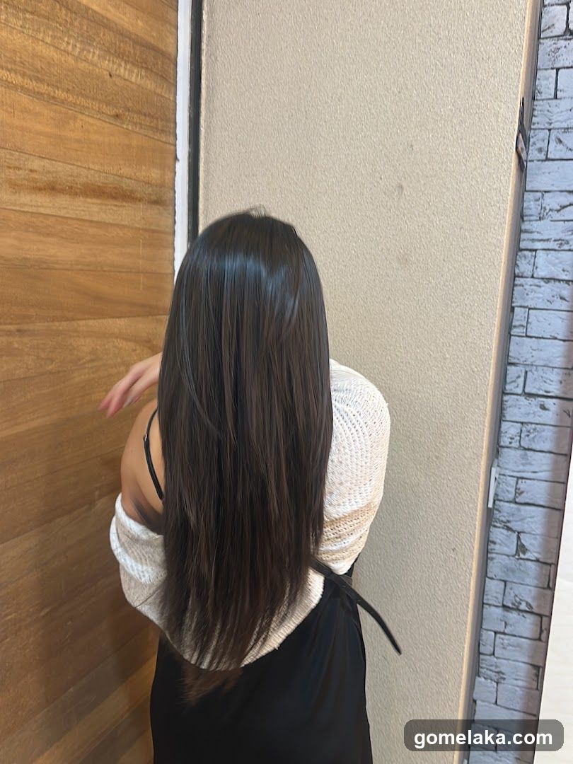Interior shot of a person with long hair