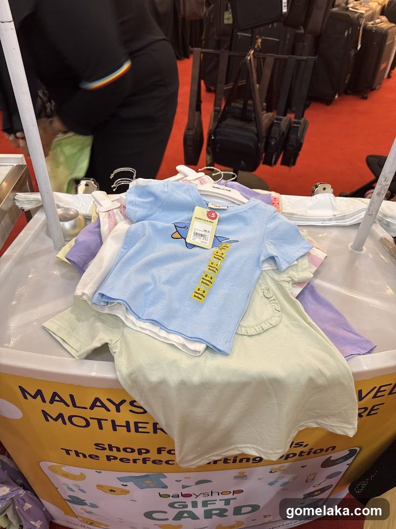 Baby Clothing Display at Event Booth