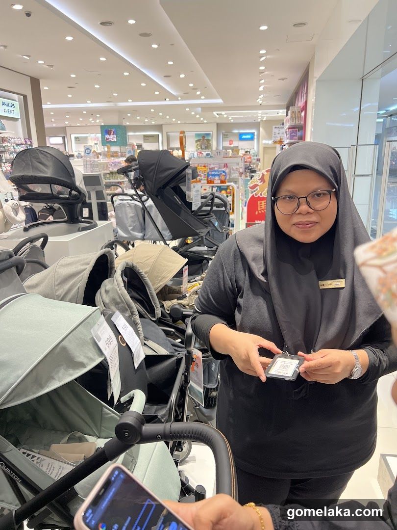 Store Interior with Baby Strollers and Staff