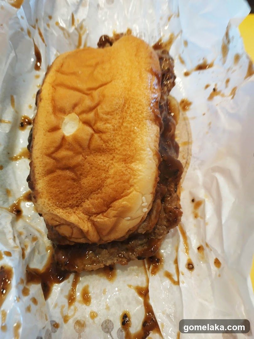 Burger on paper wrapper