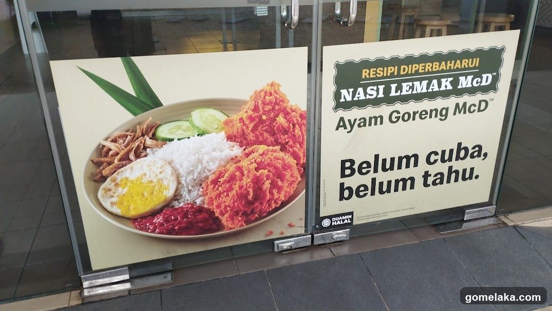 Restaurant advertisement on storefront glass
