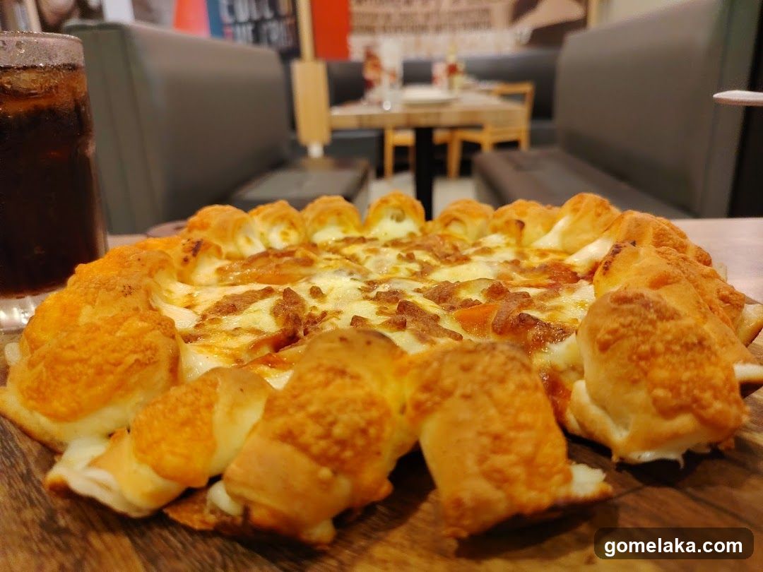 Pizza and beverage in restaurant interior