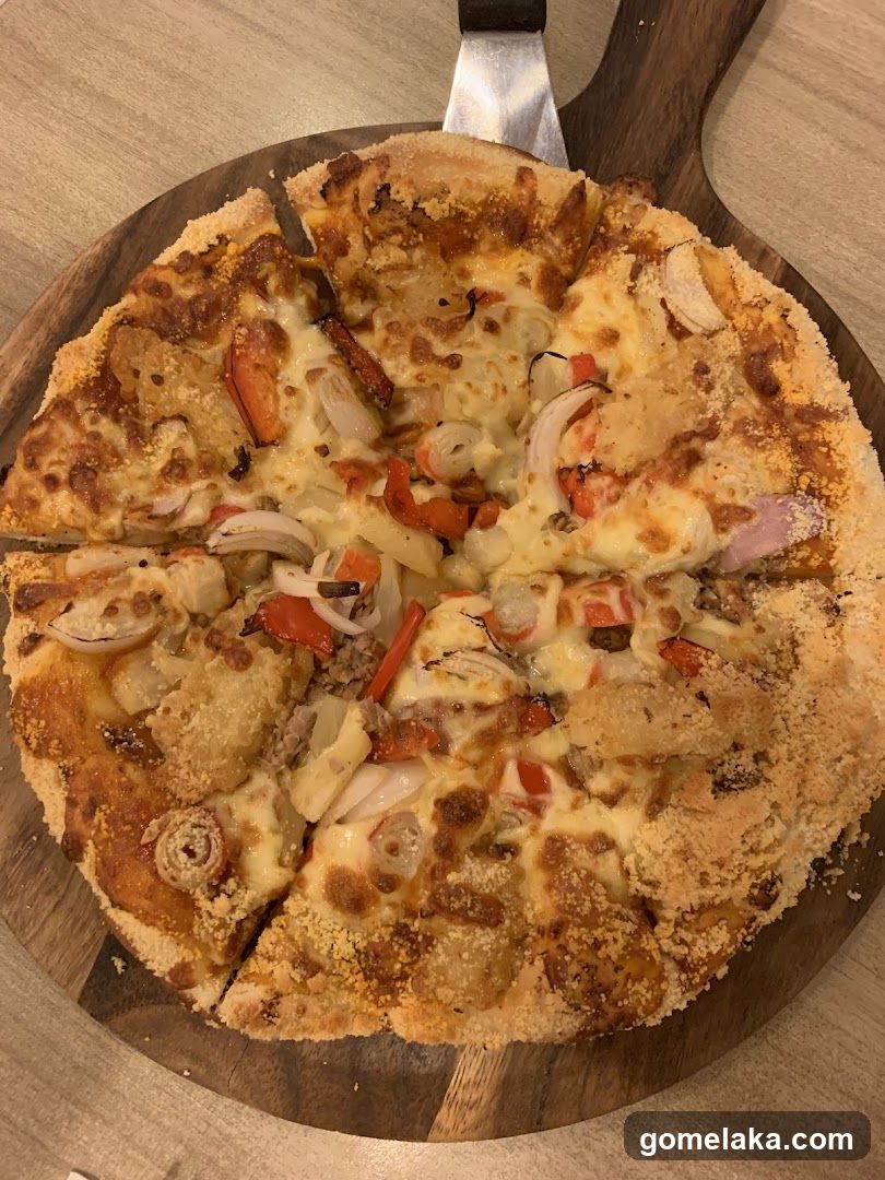 Pizza on wooden serving board