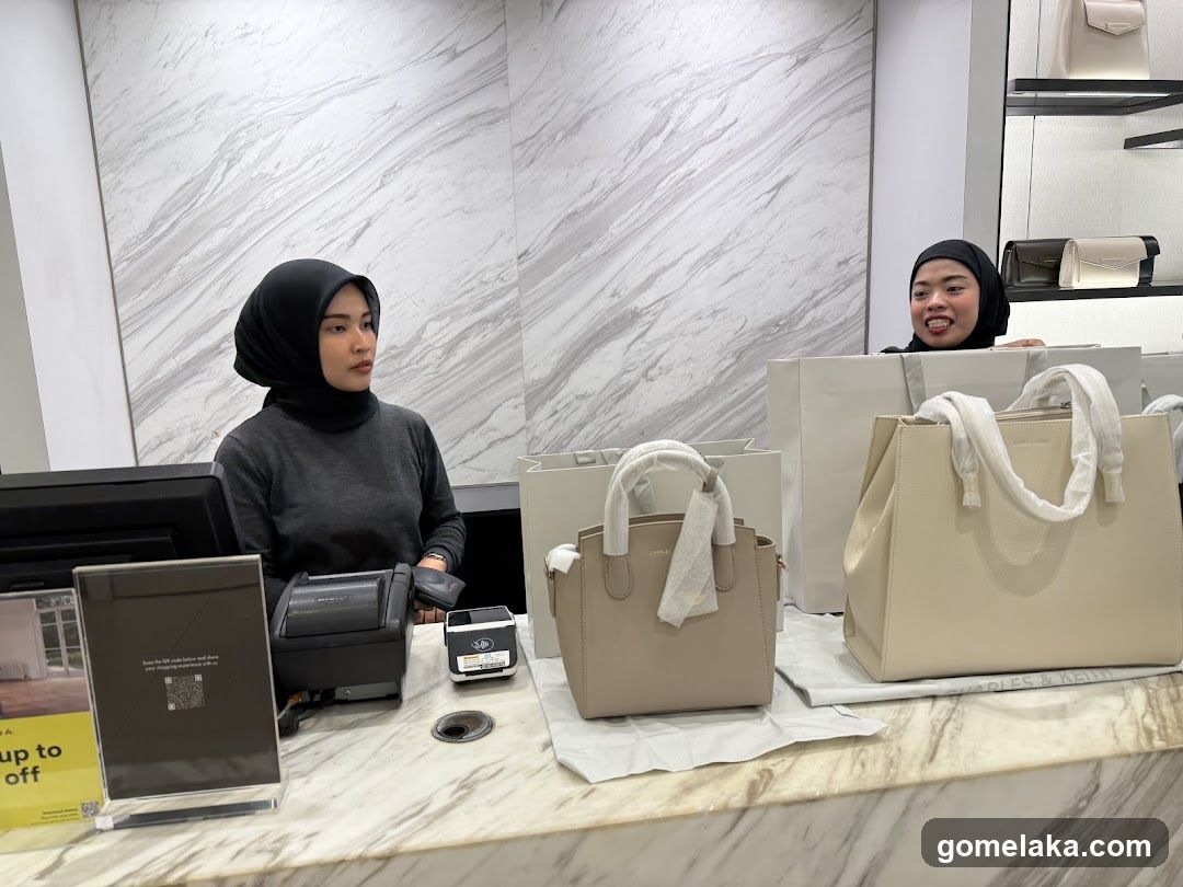 Retail Counter with Staff and Handbags