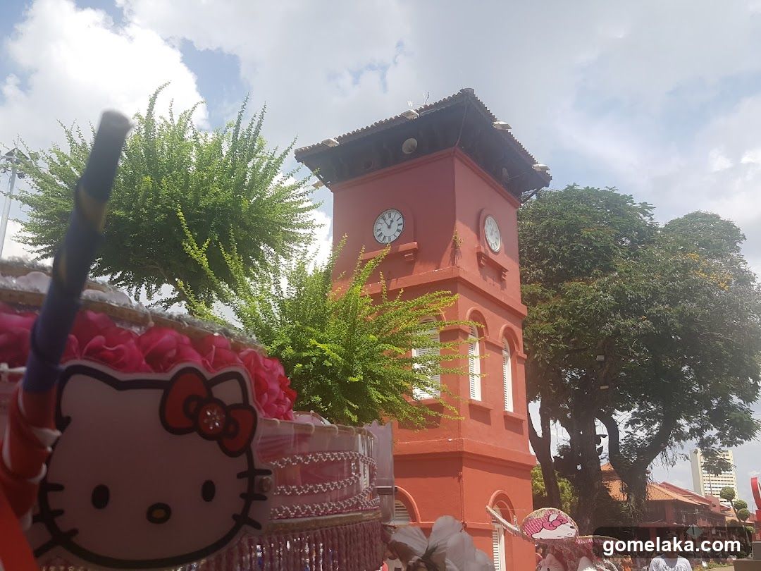 Outdoor Scene with Clock Tower and Merchandise