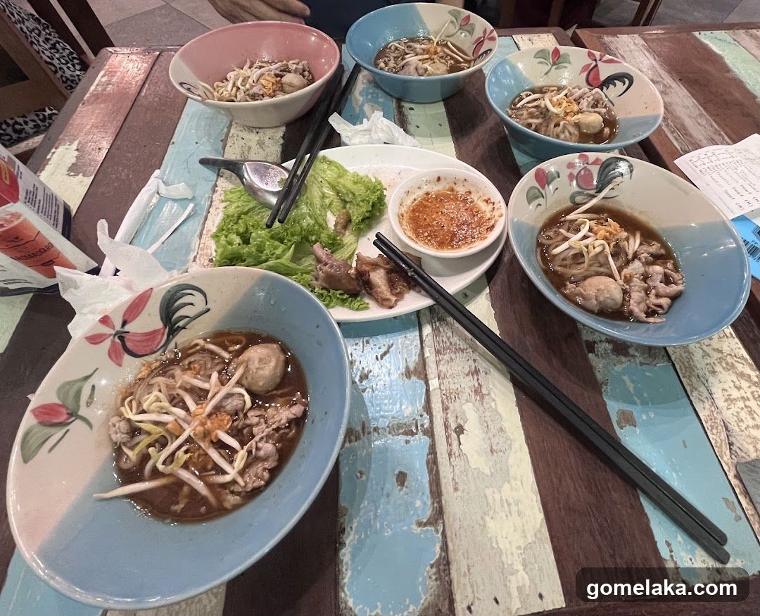 Table with Noodle Dishes