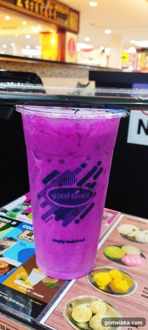 Purple beverage in a cup with logo