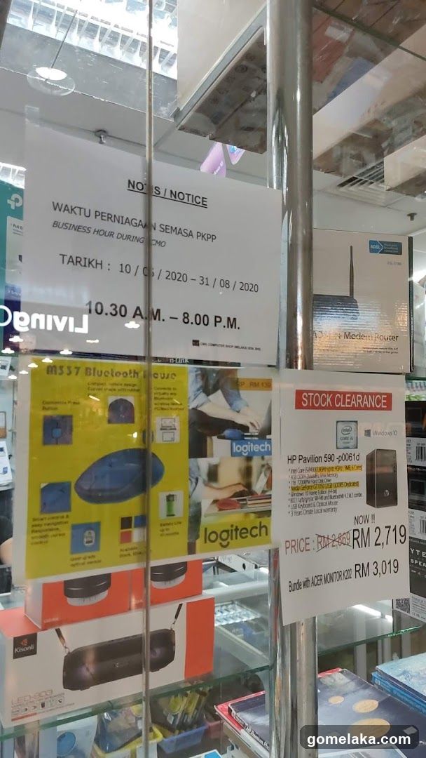 Storefront Display with Notices and Stock Clearance