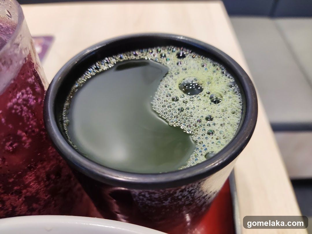 Cup of beverage with foam