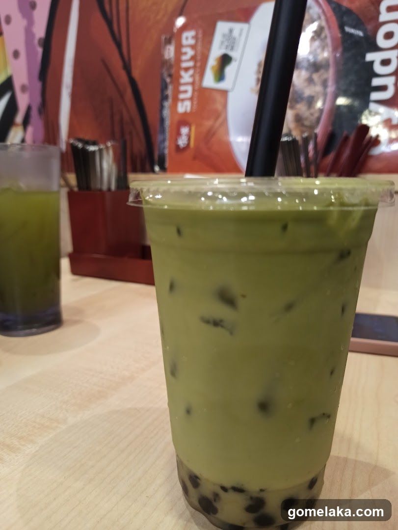Matcha Bubble Tea in Store Interior