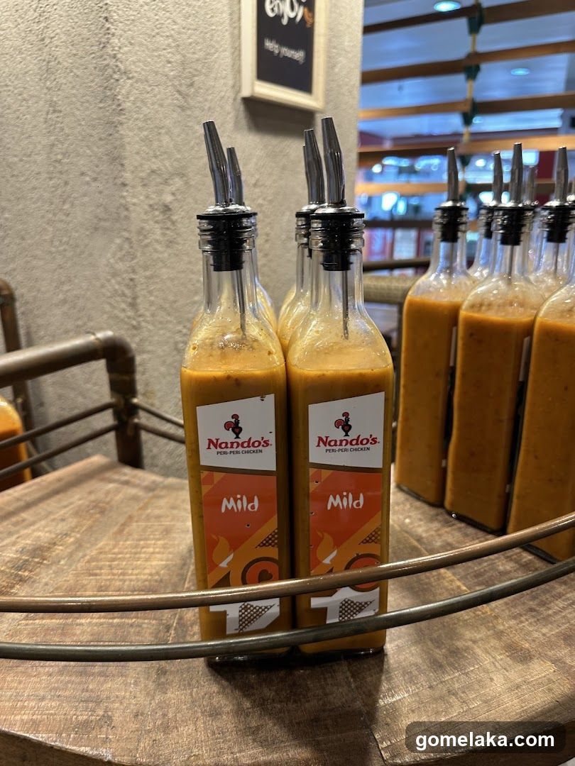 Nando's Sauce Bottles on Display