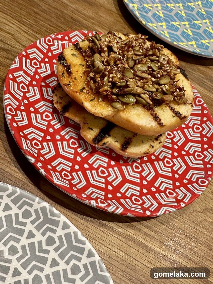 Grilled Bread with Seeds on Patterned Plate