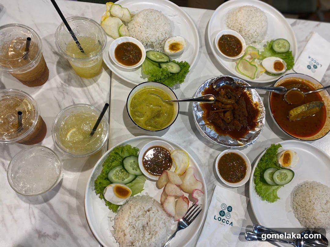 Table with Malaysian dishes and drinks