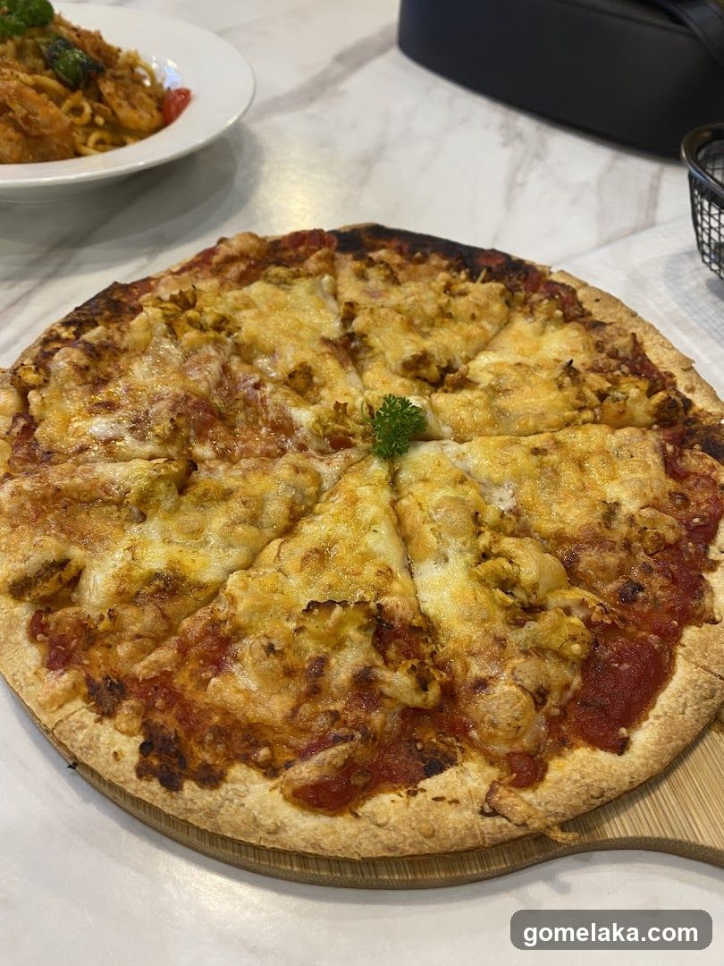 Pizza and pasta on marble table